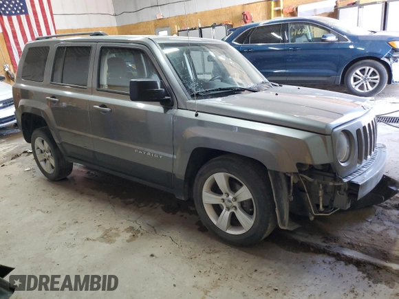 2014 Jeep Patriot Latitude with VIN 1C4NJRFBXED546921, listed as a Copart auction lot 61032895 with 133,344 mi miles and Clean title. Bid and sale history available at DreamBid. Image 4.