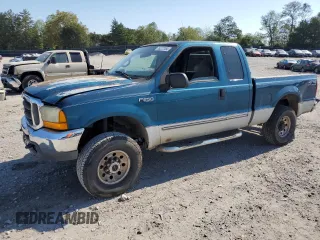 2000 Ford Super Duty F-250 XL with VIN 1FTNX21L0YED10993, listed as a Copart auction lot 74277164 with 329,899 mi miles and Salvage Title. Bid and sale history available at carsss.com. Image 1.