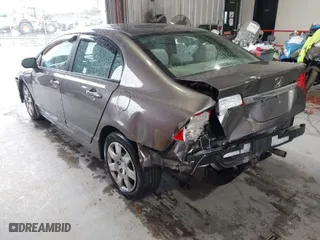 2011 Honda Civic Sdn LX with VIN 19XFA1F58BE034665, listed as a IAAI auction lot 41552809 with 170,852 mi miles. Bid and sale history available at carsss.com. Image 3.