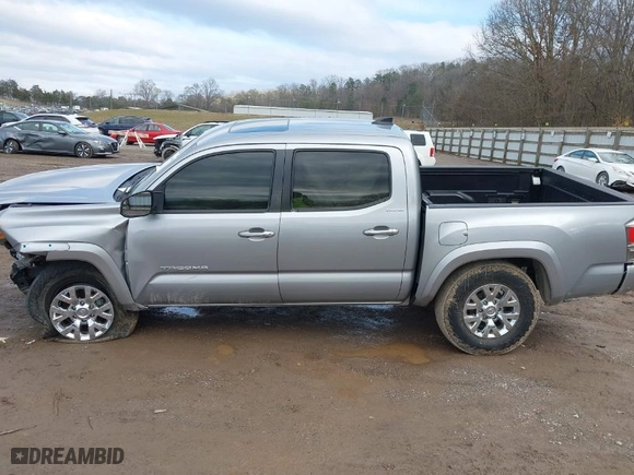 2019 Toyota Tacoma 4WD SR with VIN 3TMGZ5AN8KM259475, listed as a IAAI auction lot 41569810 with 61,405 mi miles. Bid and sale history available at carsss.com. Image 14.