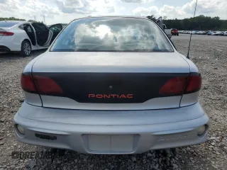 2000 Pontiac Sunfire SE z VIN 1G2JB5249Y7115960, wystawiony jako Copart lot #65038974 z przebiegiem 112 487 mil mil oraz Szkody całkowita. Historia ofert i sprzedaży dostępna na DreamBid. Obrazek 6.