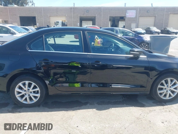 2013 Volkswagen Jetta SE with VIN 3VWDP7AJ7DM369161, listed as a IAAI auction lot 42277592 with 107,609 mi miles and . Bid and sale history available at DreamBid. Image 14.