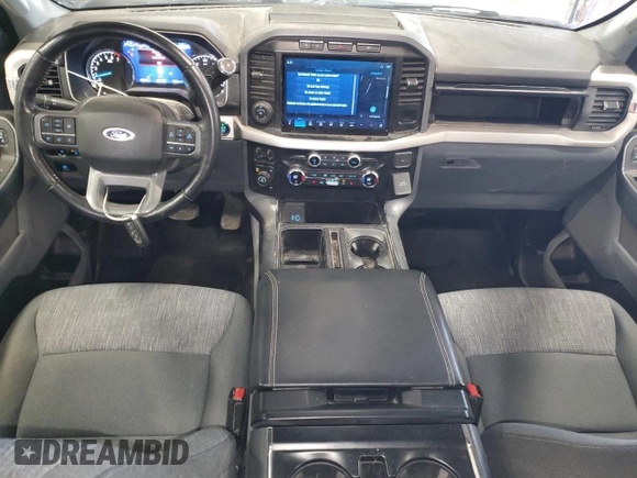 2021 Ford F-150 XL with VIN 1FTFW1E88MKE41611, listed as a Copart auction lot 61092115 with 83,277 mi miles and Salvage title. Bid and sale history available at DreamBid. Image 8.