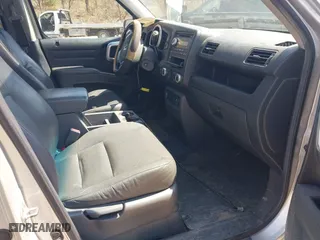 2007 Honda Ridgeline RTL w/Leather with VIN 2HJYK16557H550091, listed as a IAAI auction lot 42065256 with 209,166 mi miles. Bid and sale history available at carsss.com. Image 5.