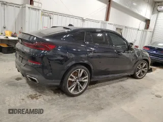2021 BMW X6 M50i with VIN 5UXCY8C05M9E21862, listed as a Copart auction lot 86329064 with 0 mi miles and Salvage Title. Bid and sale history available at carsss.com. Image 3.