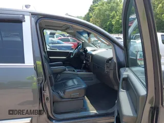 2005 Nissan Armada SE z VIN 5N1AA08B35N716999, wystawiony jako IAAI lot #42389230 z przebiegiem 185 588 mil mil oraz . Historia ofert i sprzedaży dostępna na DreamBid. Obrazek 5.