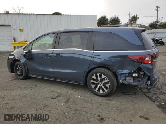 2025 Honda Odyssey EX-L with VIN 5FNRL6H69SB005860, listed as a Copart auction lot 86917704 with 4,582 mi miles and Salvage Title. Bid and sale history available at carsss.com. Image 2.