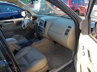 2005 Ford Escape Limited with VIN 1FMCU94185KA68739, listed as a IAAI auction lot 42752148 with 153,383 mi miles and . Bid and sale history available at DreamBid. Image 5.