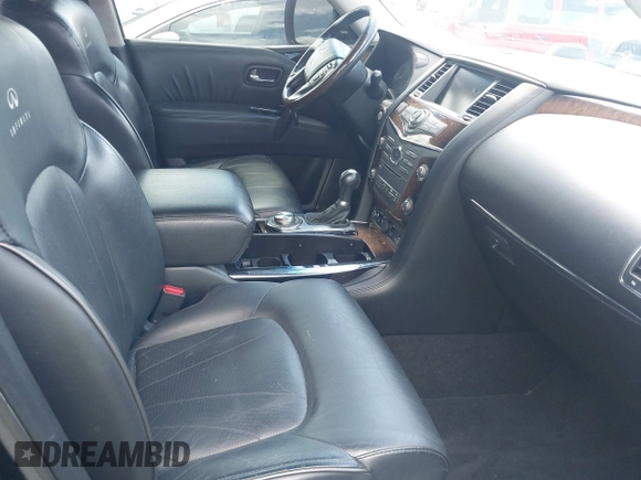 2012 Infiniti QX56 8-passenger with VIN JN8AZ2NC9C9315442, listed as a IAAI auction lot 42330752 with 167,026 mi miles and . Bid and sale history available at DreamBid. Image 5.