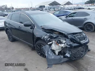 2010 Mazda CX-9 Touring with VIN JM3TB3MV7A0233588, listed as a IAAI auction lot 41189888 with 210,649 mi miles and . Bid and sale history available at carsss.com. Image 1.