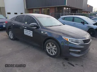 2017 Kia Optima LX with VIN 5XXGT4L32HG156845, listed as a IAAI auction lot 41402224 with 126,529 mi miles. Bid and sale history available at carsss.com. Image 1.