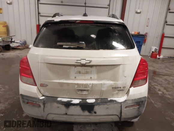 2015 Chevrolet Trax LT with VIN 3GNCJRSB7FL203418, listed as a IAAI auction lot 41572289 with 148,402 mi miles and . Bid and sale history available at DreamBid. Image 16.