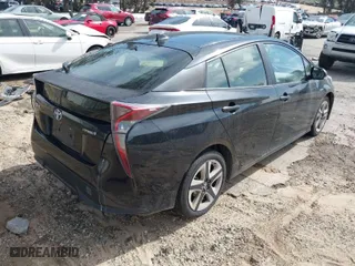2016 Toyota Prius Four with VIN JTDKARFU4G3003061, listed as a IAAI auction lot 41816989 with 188,086 mi miles. Bid and sale history available at carsss.com. Image 4.