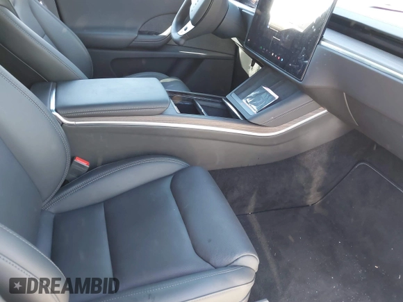 2023 Tesla Model X with VIN 7SAXCDE54PF430808, listed as a IAAI auction lot 41667924 with 21,100 mi miles and . Bid and sale history available at DreamBid. Image 5.