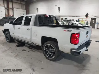 2017 Chevrolet Silverado 1500 LT with VIN 1GCVKREC4HZ266233, listed as a IAAI auction lot 41898999 with 145,503 mi miles. Bid and sale history available at carsss.com. Image 3.
