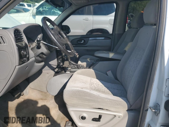 2005 GMC Envoy SLT with VIN 1GKDT13S552329269, listed as a Copart auction lot 69209244 with 154,595 mi miles and Salvage Title. Bid and sale history available at carsss.com. Image 7.