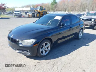 2013 BMW 3 Series 328i xDrive with VIN WBA3B5G53DNS04643, listed as a IAAI auction lot 42143365 with 107,448 mi miles. Bid and sale history available at carsss.com. Image 2.
