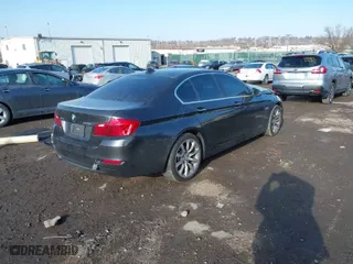 2015 BMW 5 Series 528i xDrive with VIN WBA5A7C55FG142666, listed as a IAAI auction lot 41183686 with 118,325 mi miles. Bid and sale history available at carsss.com. Image 4.