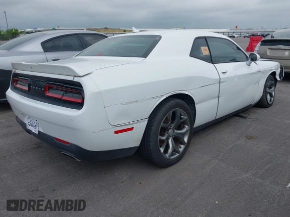 2015 Dodge Challenger SXT Plus with VIN 2C3CDZBG8FH906356, listed as a IAAI auction lot 42396865 with 184,565 mi miles and . Bid and sale history available at DreamBid. Image 4.