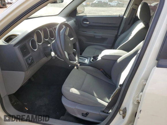 2005 Dodge Magnum SXT z VIN 2D4GZ48VX5H644848, wystawiony jako Copart lot #87614515 z przebiegiem 146 577 mil mil oraz Nie do naprawy • Non repairable. Historia ofert i sprzedaży dostępna na DreamBid. Obrazek 7.