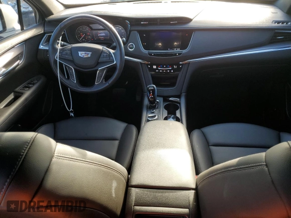 2022 Cadillac XT5 FWD Luxury z VIN 1GYKNAR48NZ163921, wystawiony jako Copart lot #74507874 z przebiegiem 5 723 mil mil oraz Nie do naprawy • Non repairable. Historia ofert i sprzedaży dostępna na DreamBid. Obrazek 8.