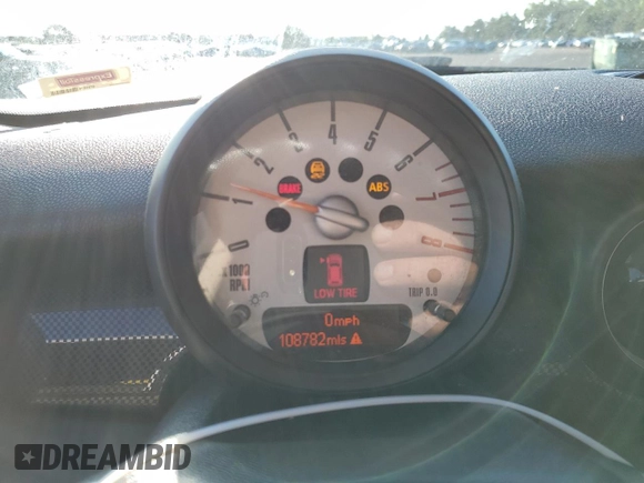 2013 MINI Hardtop S with VIN WMWSV3C59DT475621, listed as a Copart auction lot 62295405 with 108,782 mi miles and Salvage title. Bid and sale history available at DreamBid. Image 9.