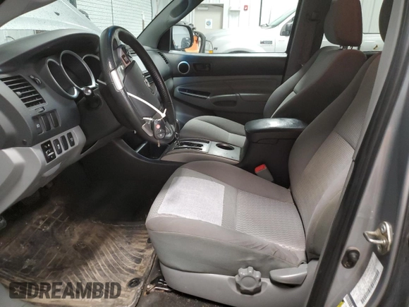 2015 Toyota Tacoma with VIN 3TMLU4EN7FM170049, listed as a Copart auction lot 52083725 with 162,062 mi miles and Salvage Title. Bid and sale history available at DreamBid. Image 7.