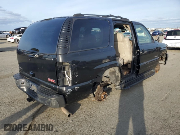 2004 GMC Yukon SLE with VIN 1GKEK13T24J206310, listed as a Copart auction lot 45712405 with 0 mi miles and Salvage Title. Bid and sale history available at carsss.com. Image 3.