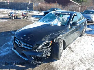 2016 Mercedes-Benz C 300 Luxury with VIN WDDWF4KB1GR142724, listed as a IAAI auction lot 41197366 with 75,309 mi miles and . Bid and sale history available at carsss.com. Image 2.