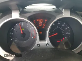 2013 Nissan Juke SL z VIN JN8AF5MV9DT222244, wystawiony jako Copart lot #59609995 z przebiegiem 169 024 mil mil oraz Szkoda całkowita • Salvage title. Historia ofert i sprzedaży dostępna na DreamBid. Obrazek 9.
