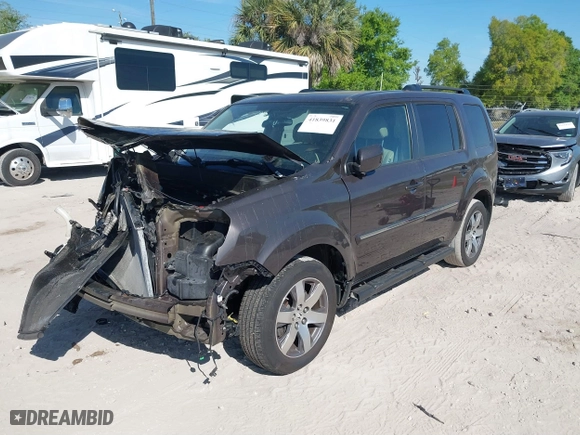 2013 Honda Pilot Touring with VIN 5FNYF4H92DB061840, listed as a IAAI auction lot 41839831 with 136,000 mi miles. Bid and sale history available at carsss.com. Image 17.