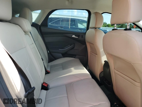 2016 Ford Focus Titanium with VIN 1FADP3N24GL302625, listed as a Copart auction lot 59180675 with 97,401 mi miles and Salvage title. Bid and sale history available at DreamBid. Image 11.