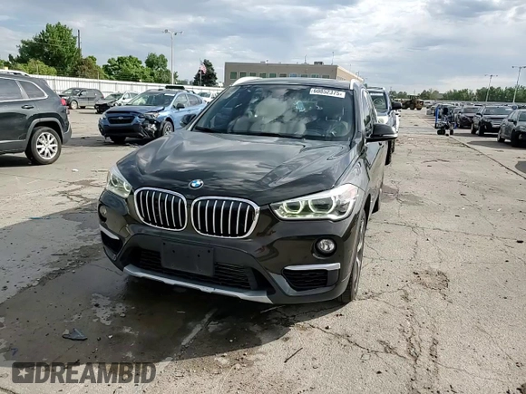 2017 BMW X1 xDrive28i with VIN WBXHT3C32H5F71690, listed as a Copart auction lot 60852375 with 67,475 mi miles and Salvage title. Bid and sale history available at DreamBid. Image 14.