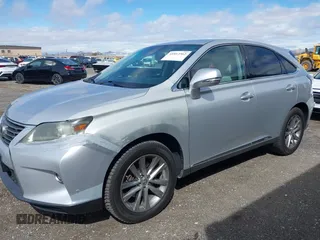 2015 Lexus RX 450h with VIN 2T2ZB1BA4FC002602, listed as a IAAI auction lot 41812562 with 166,220 mi miles and . Bid and sale history available at DreamBid. Image 2.