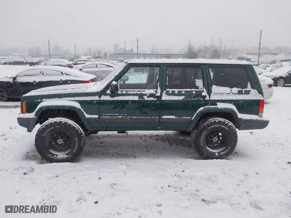 2001 Jeep Cherokee Sport with VIN 1J4FF48S31L625623, listed as a IAAI auction lot 41249234 with 99,954 mi miles. Bid and sale history available at carsss.com. Image 14.
