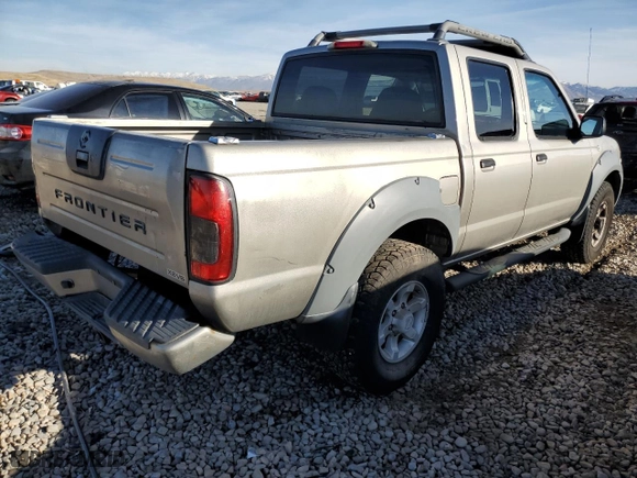 2001 Nissan Frontier 4WD SE with VIN 1N6ED27YX1C320098, listed as a Copart auction lot 85301624 with 140,756 mi miles and Salvage Title. Bid and sale history available at carsss.com. Image 3.