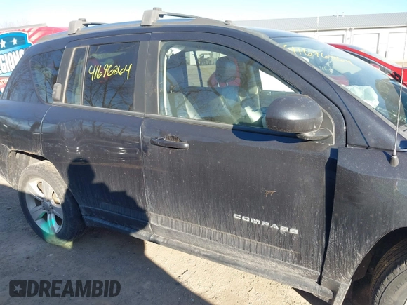 2014 Jeep Compass Latitude with VIN 1C4NJDEB7ED623202, listed as a IAAI auction lot 41696864 with 89,129 mi miles. Bid and sale history available at carsss.com. Image 13.