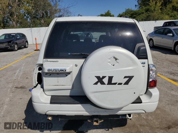 2005 Suzuki XL7 LX z VIN JS3TX92VX54100730, wystawiony jako Copart lot #74913534 z przebiegiem 91 838 mil mil oraz Szkoda całkowita • Salvage title. Historia ofert i sprzedaży dostępna na DreamBid. Obrazek 6.