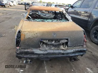 2001 Cadillac Eldorado ESC z VIN 1G6EL12Y81B110048, wystawiony jako Copart lot #69995914 z przebiegiem Nie podano mil oraz Nie do naprawy. Historia ofert i sprzedaży dostępna na DreamBid. Obrazek 6.