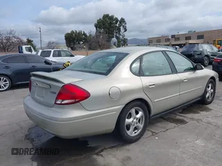 2004 Ford Taurus SES with VIN 1FAFP55U94A108654, listed as a IAAI auction lot 41585381 with 98,843 mi miles and . Bid and sale history available at carsss.com. Image 4.