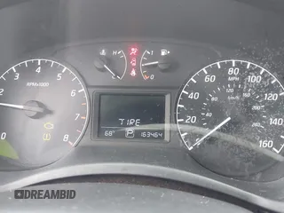 2014 Nissan Sentra S with VIN 3N1AB7AP2EL607775, listed as a IAAI auction lot 42127174 with 163,464 mi miles and . Bid and sale history available at DreamBid. Image 7.