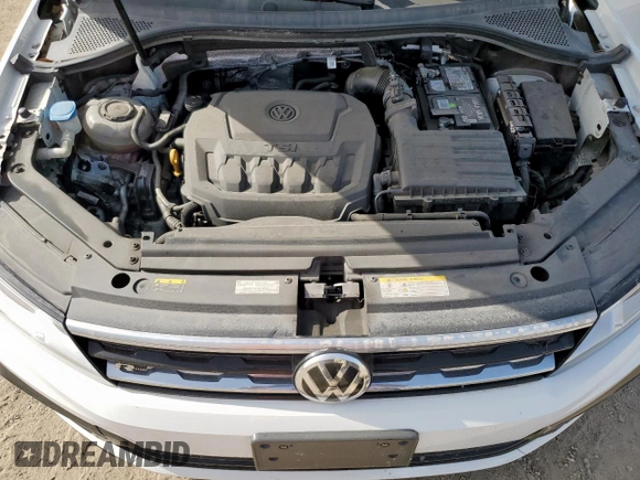 2021 Volkswagen Tiguan SE z VIN 3VV3B7AX9MM003432, wystawiony jako Copart lot #63422315 z przebiegiem 64 531 mil mil oraz Czysty tytuł • Clean title. Historia ofert i sprzedaży dostępna na DreamBid. Obrazek 12.
