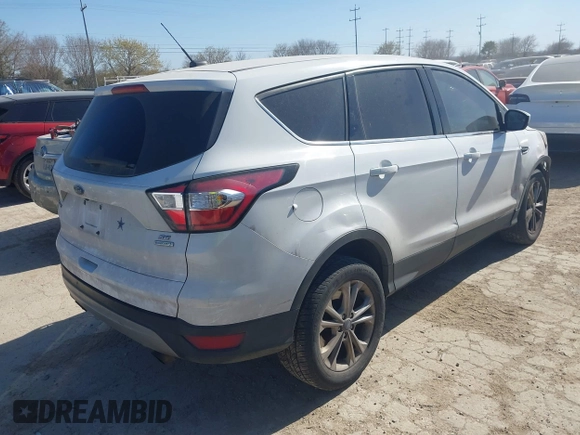 2017 Ford Escape SE with VIN 1FMCU0G90HUD85582, listed as a IAAI auction lot 41733013 with 129,961 mi miles and . Bid and sale history available at DreamBid. Image 4.