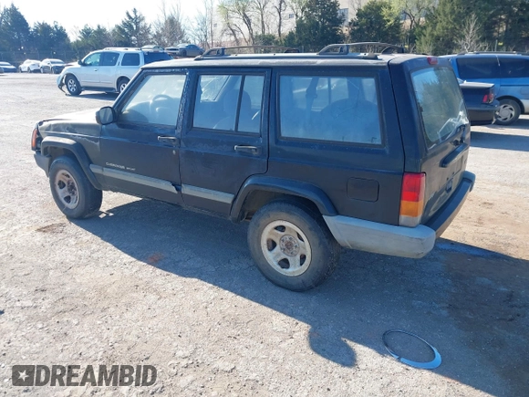 2001 Jeep Cherokee Sport with VIN 1J4FT48SX1L581192, listed as a IAAI auction lot 41828841 with 315,822 mi miles. Bid and sale history available at carsss.com. Image 3.