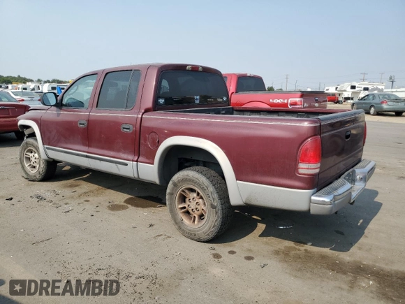 2000 Dodge Dakota Sport with VIN 1B7GG2AN1YS699073, listed as a Copart auction lot 70782284 with 141,876 mi miles and Salvage Title. Bid and sale history available at carsss.com. Image 2.