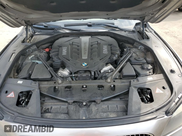 2012 BMW 7 Series 750Li with VIN WBAKB8C51CC962834, listed as a Copart auction lot 56592645 with 72,665 mi miles and Salvage title. Bid and sale history available at DreamBid. Image 11.