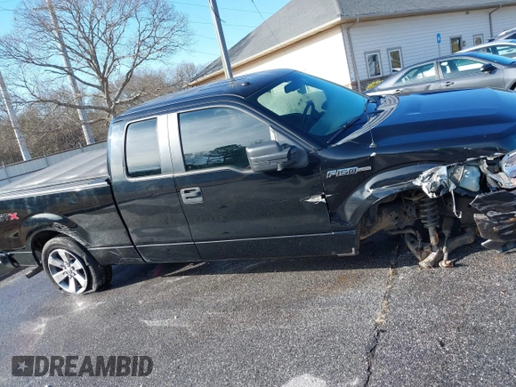 2009 Ford F-150 STX with VIN 1FTRX12WX9FA69251, listed as a IAAI auction lot 41341658 with 169,074 mi miles. Bid and sale history available at carsss.com. Image 13.