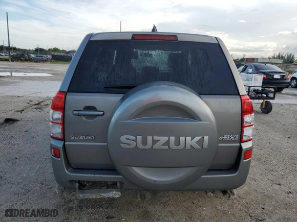 2010 Suzuki Grand Vitara Premium with VIN JS3TE0D21A4101120, listed as a Copart auction lot 71016604 with 99,917 mi miles and Salvage Title. Bid and sale history available at carsss.com. Image 6.
