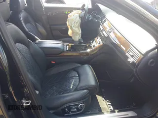 2015 Audi A8 4.0T with VIN WAU32AFD3FN039603, listed as a IAAI auction lot 42267467 with 120,393 mi miles and . Bid and sale history available at DreamBid. Image 5.