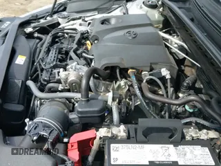 2023 Toyota Camry SE z VIN 4T1G11AK5PU726016, wystawiony jako IAAI lot #41870301 z przebiegiem 62 110 mil mil oraz . Historia ofert i sprzedaży dostępna na DreamBid. Obrazek 18.